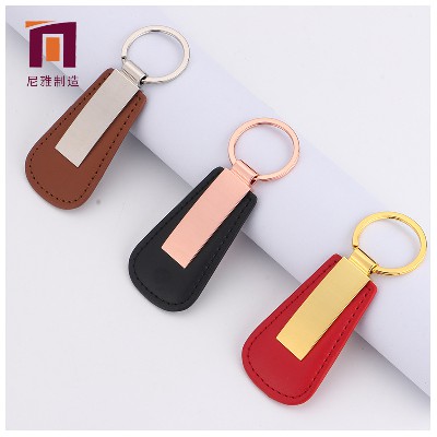 Wholesale metal leather keychains for men and women's bags, hanging accessories, car hanging accessories, small gifts, creative keychains for companies