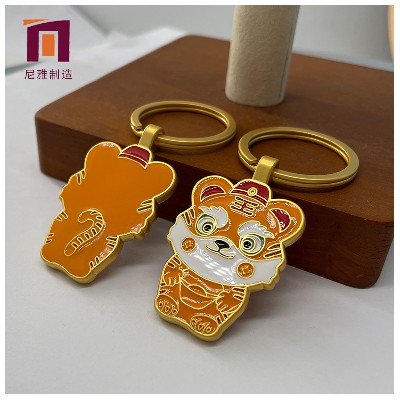 Wholesale of creative keychains for the Year of the Tiger by manufacturers, New Year gift pendants, keychains, tiger figurines, metal pendants, gifts