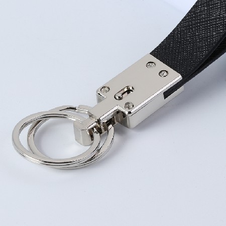 Black leather decorative metal keychain, creative small gift logo for car accessories, metal keychain